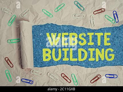 Handwriting text writing Website Building. Conceptual photo site is constructed according to the clients needs Stock Photo