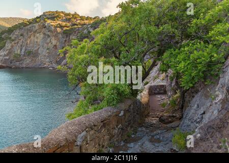 Trail Golitsyn - Falcon Path a mountain pathway carved on the side of Koba-Kaya Stock Photo