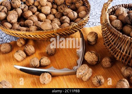 Tasty walnuts composition on table with blue tablecloth Stock Photo