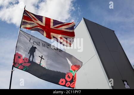 A week after a Black Lives Matter protest turned to violence when the statue of wartime Prime Minister Sir Winston Churchill was daubed in graffiti which called him a racist, and despite warning from police not to attend protests at all today - and to be off the streets by 5.00pm - a large group crowd of right-wing groups and veterans gathered at the boxed-in statue to 'protect it from further vandalism' by Black Lives Matter and anti-racism protesters, on 13th June 2020, in London, England. Stock Photo