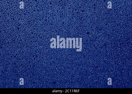 Colored dark background or texture of plastic structure Stock Photo