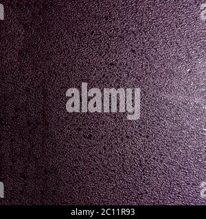 Colored dark background or texture of plastic structure Stock Photo