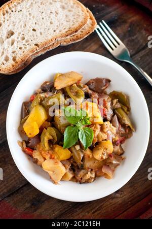 delicious caponata typical Sicilian dish with peppers , tomatoes and eggplant Stock Photo