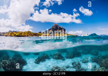 Tropical blue ocean with Le Morne mountain in Mauritius. Stock Photo