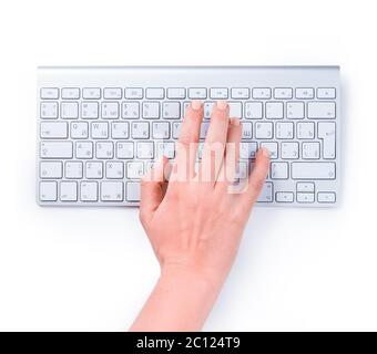Typing femle hand on keyboard isolated over white Stock Photo