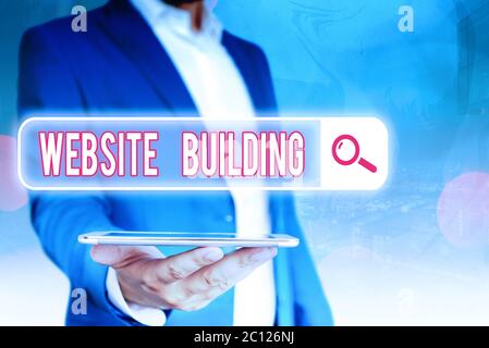 Handwriting text Website Building. Conceptual photo site is constructed according to the clients needs Stock Photo