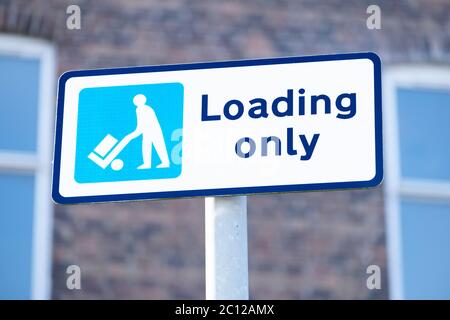 No goods vehicles loading at any time road sign Stock Photo