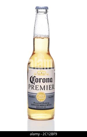IRVINE, CALIFORNIA - 12 JUNE 2020: A single bottle of Corona Premier beer with condensation isolated on white with reflection. Stock Photo