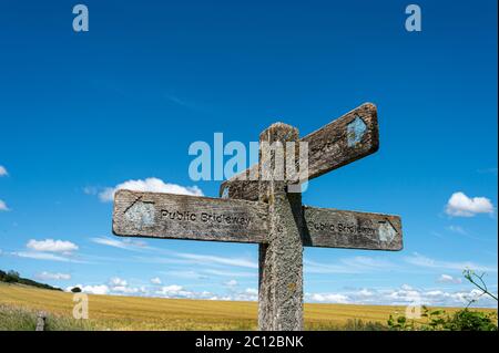 Public bridleway, wooden sign. Stock Photo