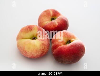 Close-up of ripe peaches on a white background Stock Photo