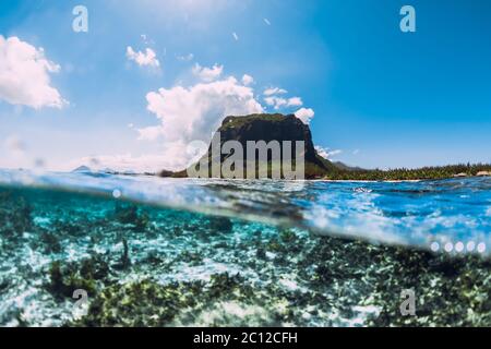 Tropical ocean with Le Morne mountain in Mauritius. Split view. Stock Photo