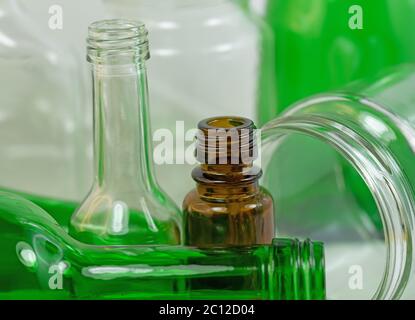 Old empty bottles and glasses for recycling Stock Photo