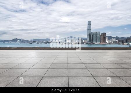 modern office buildings in hong kong from empty brick floor Stock Photo