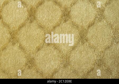 Top view of a vintage aged yellow carpet. Carpet pattern Stock Photo
