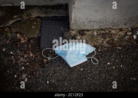 Tulse Hill, London, England. 13th June 2020. A discarded medical face mask, used to prevent the spread of Coronavirus, on the floor in Tulse Hill in South London, England. (photo by Sam Mellish / Alamy Live News) Stock Photo