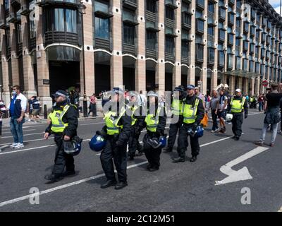 London. UK. June the 13th 2020. Riot police officers marching down Bridge Street to Parliament Square. Stock Photo