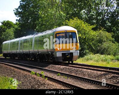 Chiltern Railways by Arriva Class 168 Clubman passes Claydon in Oxfordshire on the way from London Marylebone to Birmingham Moor Street Stock Photo