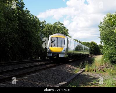 Chiltern Railways by Arriva Class 168 Clubman passes Claydon in Oxfordshire on the way from Birmingham Moor Street to London Marylebone Stock Photo