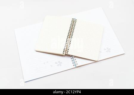 Opened new notebook and placed on the gray background Stock Photo