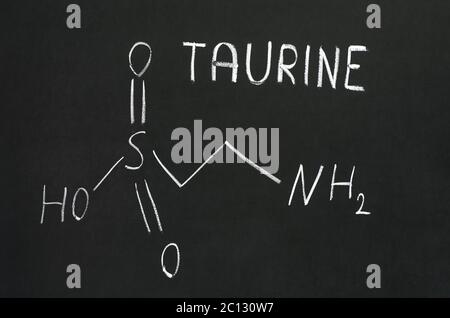 Chemical formula of taurine on a blackboard Stock Photo