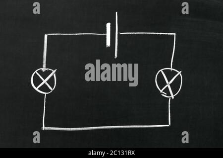 The electrical diagram drawn on a blackboard with chalk Stock Photo