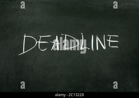 Word Deadline writed on blackboard with chalk Stock Photo