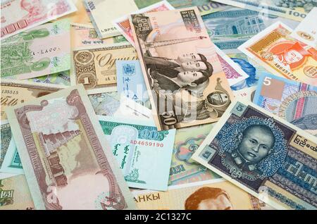 Background of different currency from countries around the world Stock Photo