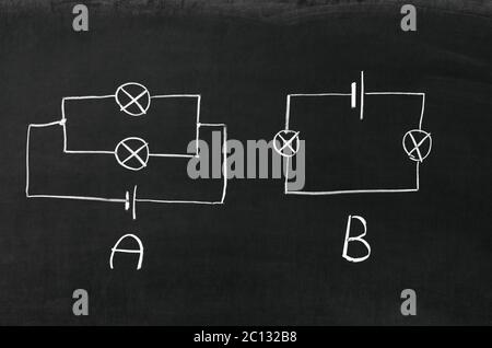 The electrical diagram drawn on a blackboard with chalk Stock Photo