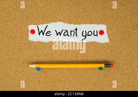We want you text note message pin on bulletin board Stock Photo