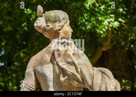 Paris, France - Jul 14, 2014: Old statue in Champs elysees garden in Paris, France Stock Photo
