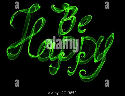 Be Happy isolated text written with flame fire light on black background. Green color Stock Photo