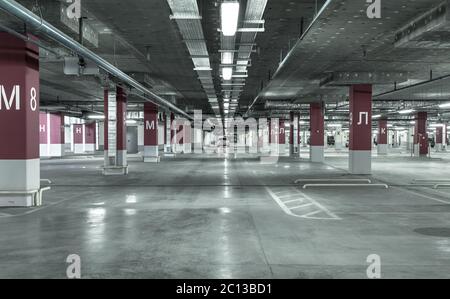 Empty underground parking garage Stock Photo