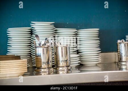 Dessert plates stacked in a restaurant Stock Photo