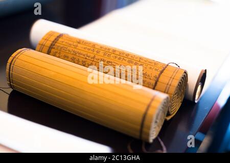 blank calligraphy scroll paper on table in modern study Stock Photo
