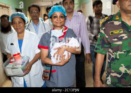 DHAKA, BANGLADESH 16th August : Suraiya infant who was took bullet in mother’s womb shifted to her mother at Dhaka Medical College Hospital, Banglades Stock Photo