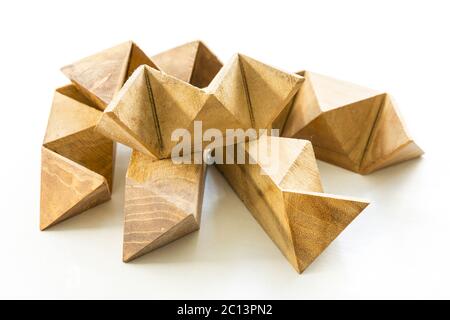 Wooden puzzle on white Stock Photo