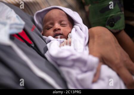 DHAKA, BANGLADESH 16th August : Suraiya infant who was took bullet in mother’s womb shifted to her mother at Dhaka Medical College Hospital, Banglades Stock Photo