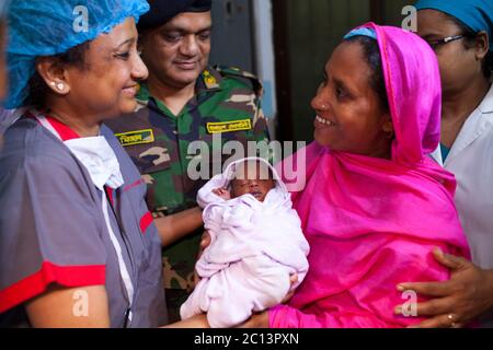 DHAKA, BANGLADESH 16th August : Suraiya infant who was took bullet in mother’s womb shifted to her mother at Dhaka Medical College Hospital, Banglades Stock Photo