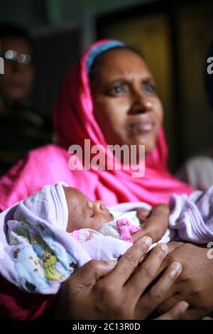 DHAKA, BANGLADESH 16th August : Suraiya infant who was took bullet in mother’s womb shifted to her mother at Dhaka Medical College Hospital, Banglades Stock Photo