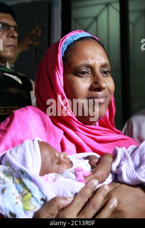 DHAKA, BANGLADESH 16th August : Suraiya infant who was took bullet in mother’s womb shifted to her mother at Dhaka Medical College Hospital, Banglades Stock Photo