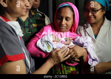 DHAKA, BANGLADESH 16th August : Suraiya infant who was took bullet in mother’s womb shifted to her mother at Dhaka Medical College Hospital, Banglades Stock Photo