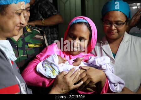 DHAKA, BANGLADESH 16th August : Suraiya infant who was took bullet in mother’s womb shifted to her mother at Dhaka Medical College Hospital, Banglades Stock Photo