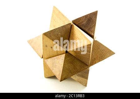 Wooden puzzle on white Stock Photo