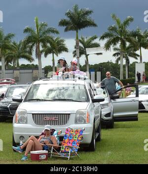 June 13, 2020 - Sarasota, Florida, United States - Spectators enjoy the show at Nik Wallenda's Daredevil Rally, billed as the world's first drive-in stunt show, on June 13, 2020 in Sarasota, Florida. The show, which runs on select dates through June 21, features internationally known daredevil performers and is designed to be a safe event during the coronavirus pandemic, with the separation of spectator's vehicles according to social distancing guidelines. (Paul Hennessy/Alamy) Stock Photo
