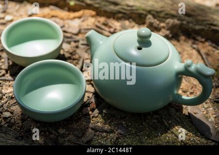 Tea culture, outdoor tea set. Close up shot of the tea set on the floor. Stock Photo