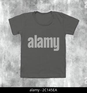 Grey blank t-shirt on dark cracked background Stock Photo