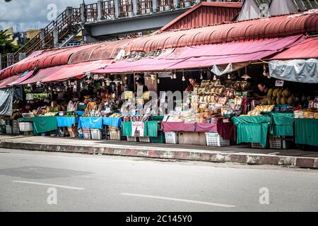 Chiang Mai, Thailand - July 2017. Chaing Mai vender selling fruit and vegetables Stock Photo