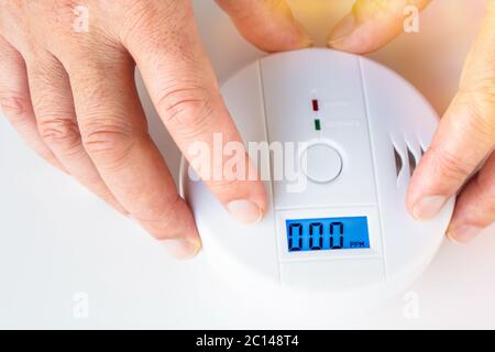 Installation of a smoke and fire alarm with carbon monoxide sensor capability Stock Photo