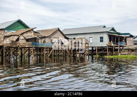 Village houses at Kampong Phluk on the Tonle Sap lake near Siem Reap, Cambodia. Stock Photo