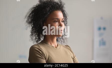 Three quarter portrait of African American businesswoman in office Stock Photo